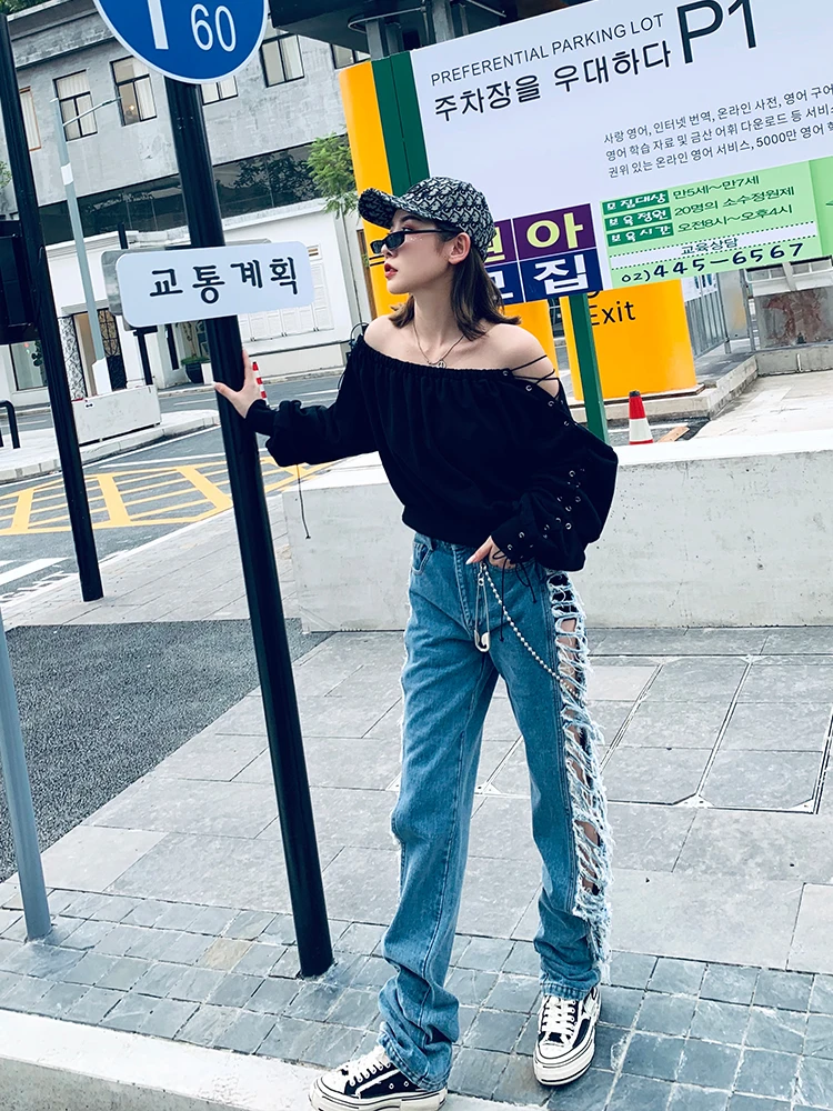 Модные брендовые женские джинсы с боковыми дырками на весну 2020 свободные