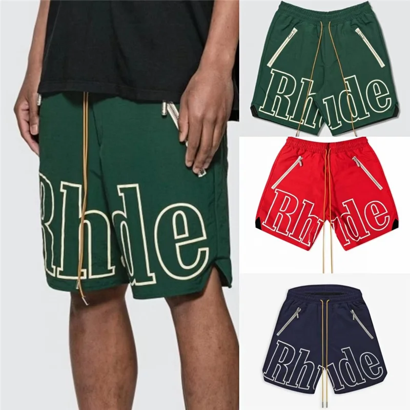 

Rhude Shorts Men Women 1:1 High Quality Big Letter Logo Rhude Shorts Oversize Breechcloth Yellow drawstring Pill Zipper Head