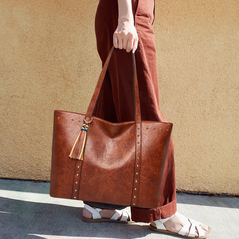 

Female Bag 2021 New European And American Fashion Retro Large Capacity Portable Shoulder Bag Rivet Simple Tote Bag