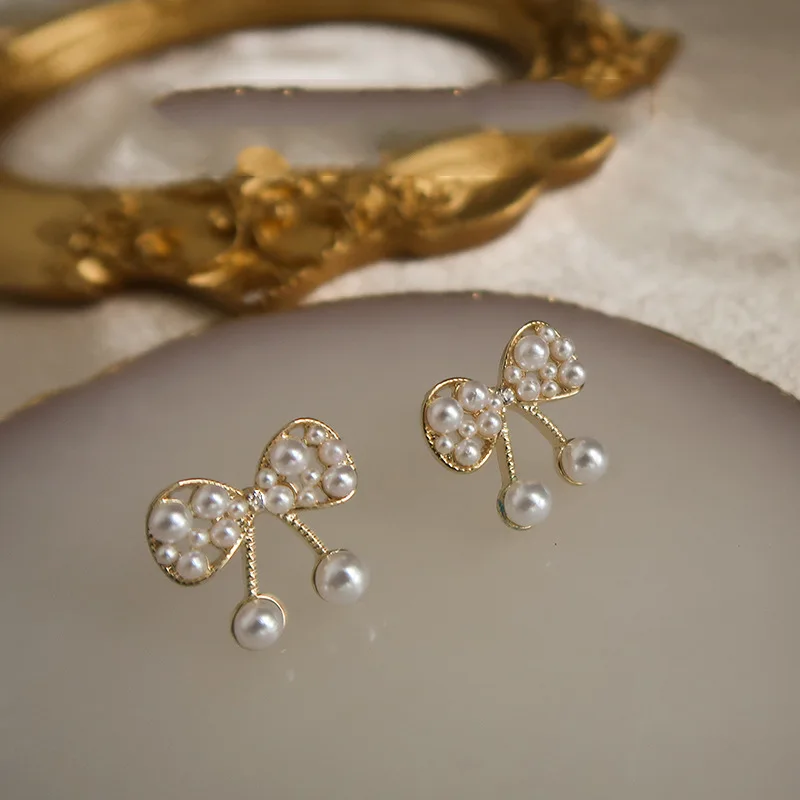 

2020 New Fahion Women's Earrings Fine Simple Bowknot Pearl Earrings for Women Bijoux Korean Girl Party Jewelry Gifts Wholesale