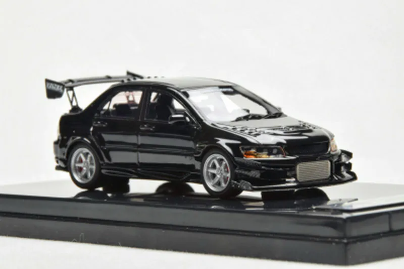 

Коллекция полимерных моделей автомобилей 1:64 Mitsubishi Lancer Evolution IX Voltex 404