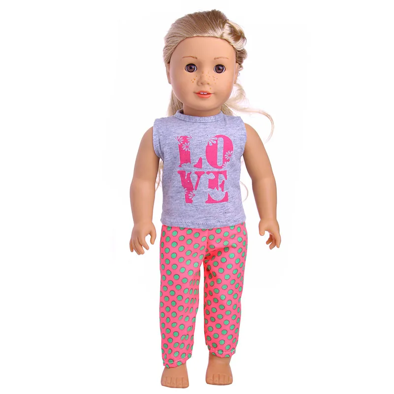 Цвет нежно-розовый без рукавов футболка с узором в стиле граффити + зеленые штаны