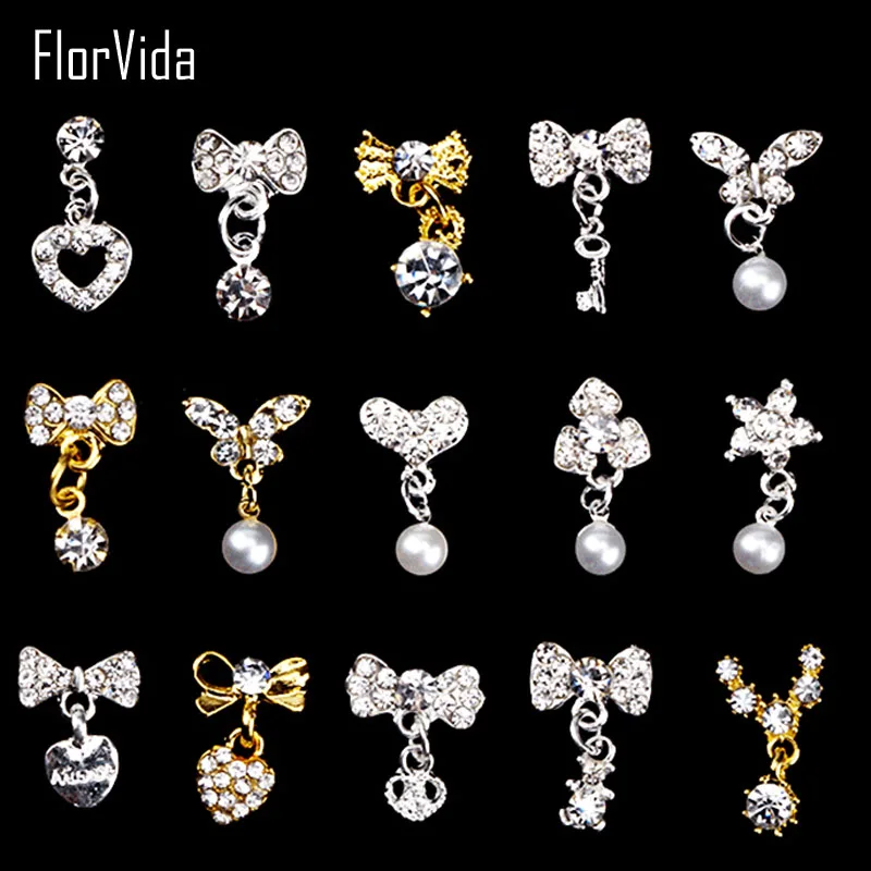 

FlorVida 10pcs Kit Nail Art Rhinestones Gems 3D Crystals Strass Stones Alloy Pendant bow-knot Gold Silver Studs for Nails Set