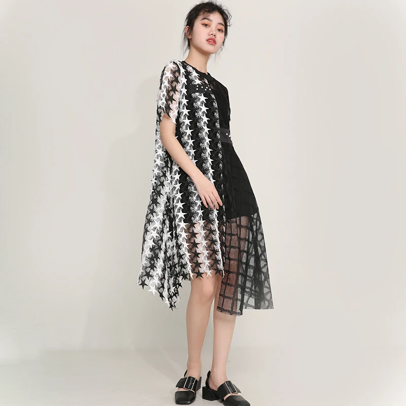 Женское свободное платье EAM черное асимметричное с круглым вырезом и коротким