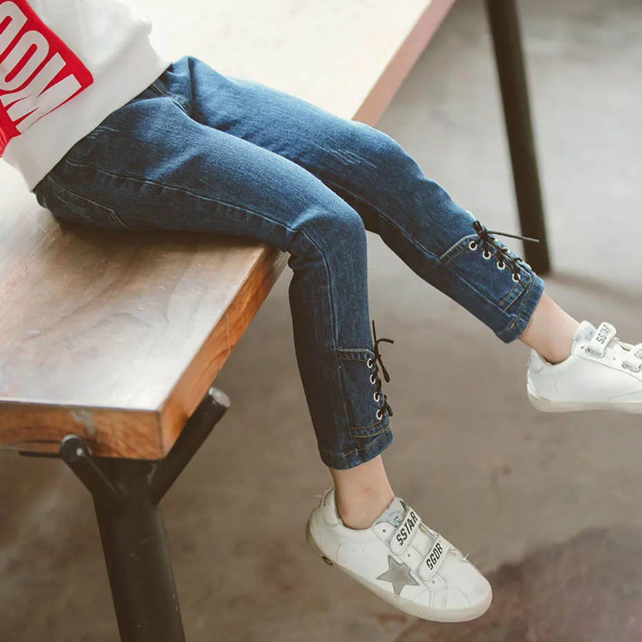 Джинсы для девочек модные джинсы в стиле пэчворк с бантом на завязках детей