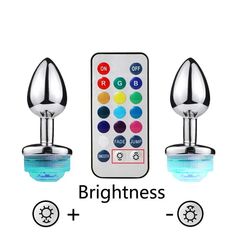 Анальная пробка металлическая светящаяся с беспроводным дистанционным