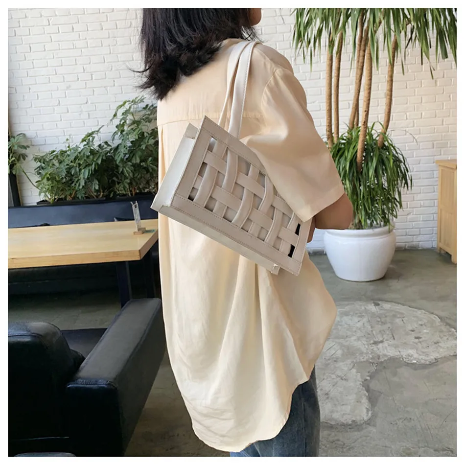 

French Bag Niche Designer Fashion Armpit Woven Hollow Shoulder