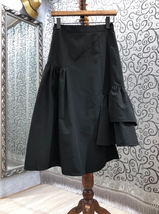 

2021 spring and summer new women's solid color decoration irregular A-shape versatile skirt 326