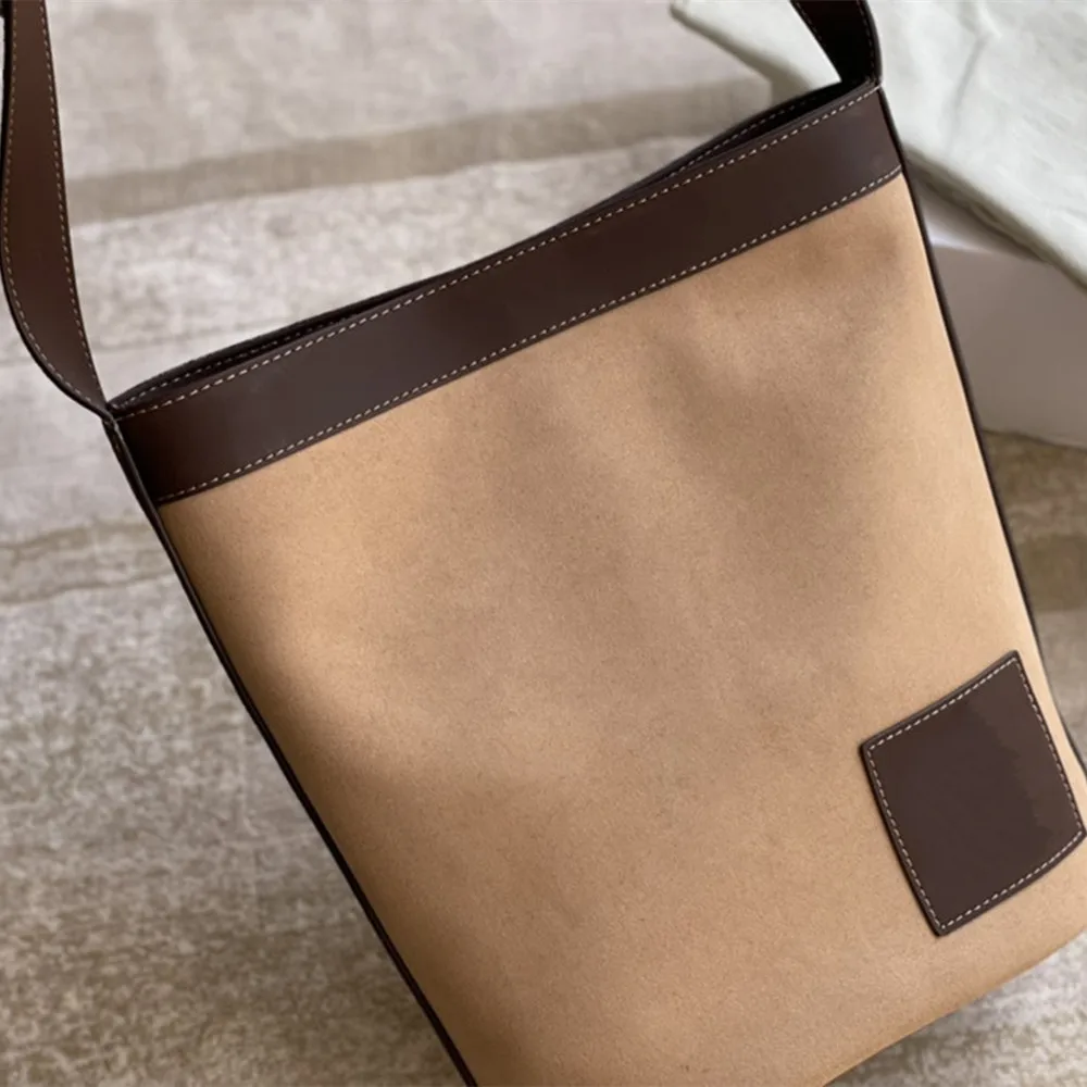 

Хорошо в роде, например, сумка для покупок, большая емкость, хорошая текстура, сумка через плечо, сумка-мессенджер, простая и универсальная ...