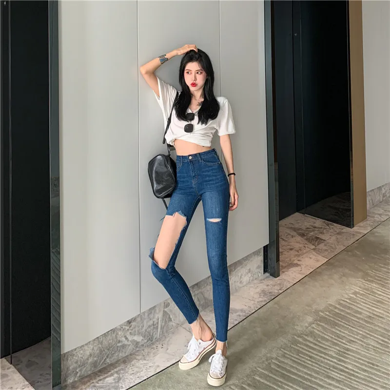 

New sexy high-waisted tight-fitting big hole jeans, hip-lifting and slimming nine-point beggar pants