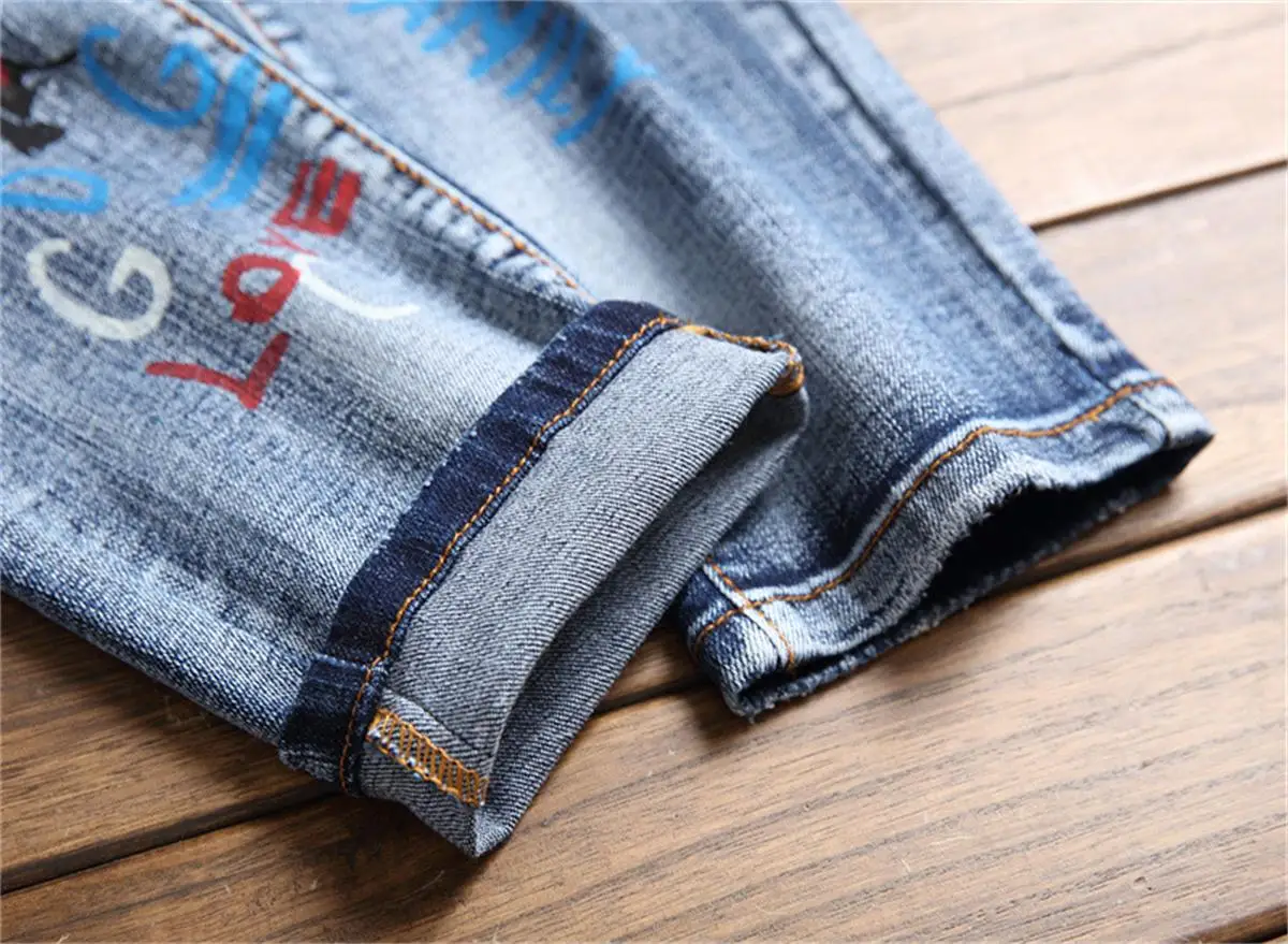 American style new letter washing printing cat whisker white men's slim micro-elastic jeans trendy men's trousers