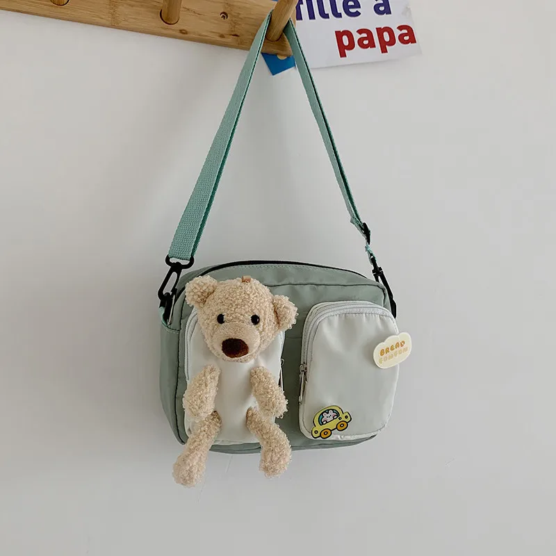 

Cute women's one-shoulder canvas bag bear decoration double pocket zipper girl mobile phone bag mini fashion student bag