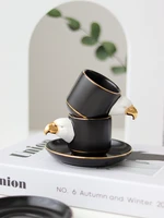 luxury matte black painted italian trumpet concentrated coffee cup and saucer set creative carved mouth shape handle cup rugrats