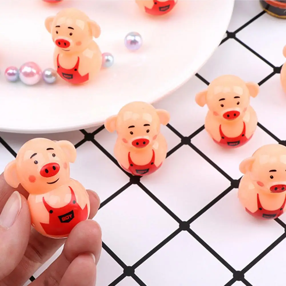 

2021 Children's Fun Toys Cute And Simple Piggy Shape Tumbler Rattle Educational Toys Fun Decorative Toys For Kids