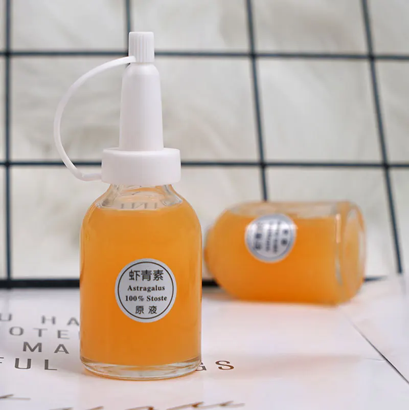 

30ml Astaxanthin Stock Solution 30ml Anti-glycation Brightening and Improving Dark Yellow Lifting Firming Essence