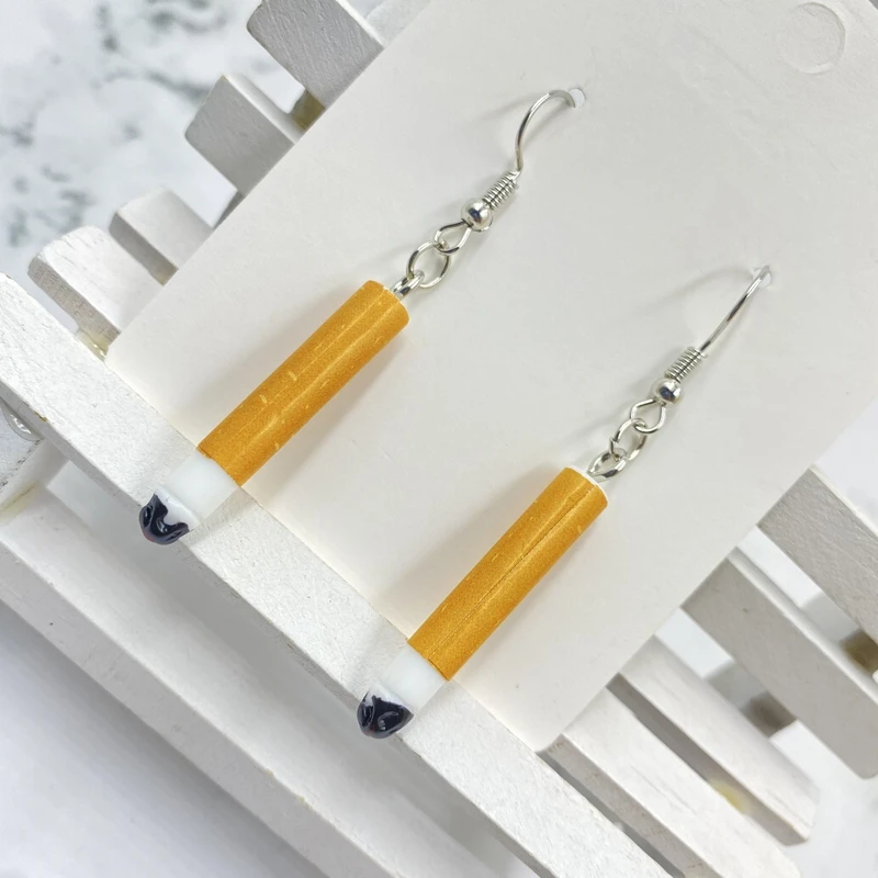 

Korea's latest fashion funny cigarette-shaped dangling ladies handsome earrings earrings