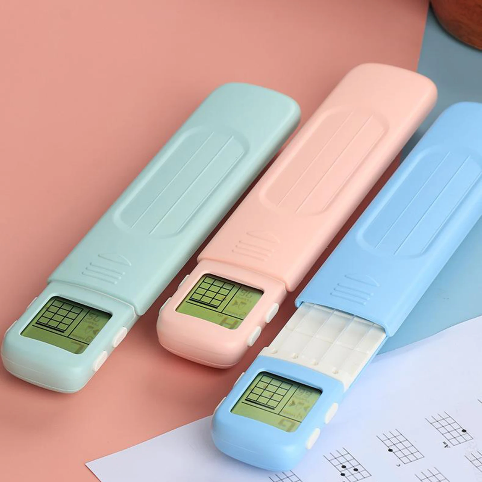 

Mini Pocket Guitar Chord Trainer 4 Fret Portable Ukelele Chord Trainer Pocket Guitar Practice Tools w/ Screen for Beginners Kids