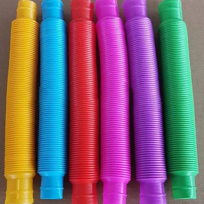 

8pcs Creative Magical Toy Colorful Circle Funny Toys Gift Folding Plastic Pop Tube Coil Children'S Development Educational 2020