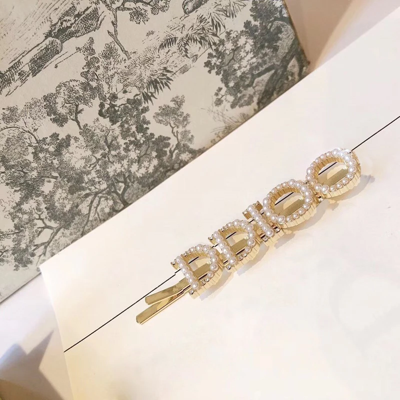 

C2078 New braided hairpin hot-selling classic letter shell pearl hair ring light luxury trend temperament hair accessories