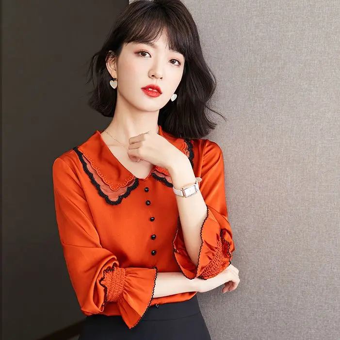 

Make big shirt female temperament of the spring and autumn period and the new high-end embroidery lapel long sleeve mulberry sil
