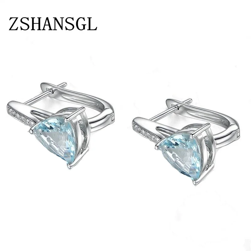 Женские серьги гвоздики серебристого цвета с светильник