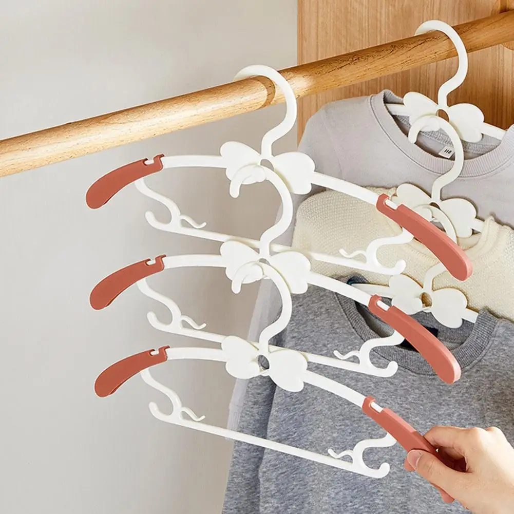 

10pcs/set drying rack telescopic clothes rack long service life PP baby clothing coat rack household goods