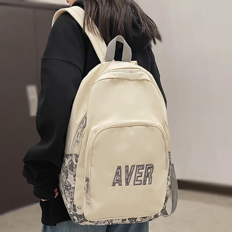 

Нейлоновая сумка с граффити для мужчин и женщин, модный дорожный рюкзак с вышивкой для мальчиков и девочек, Студенческая милая сумка для ноу...