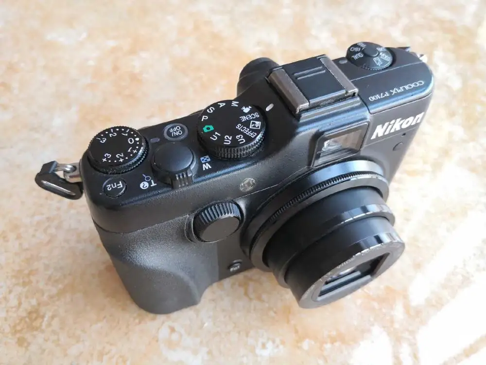 Цифровая камера Nikon COOLPIX P7100 10 1 МП с оптическим зумом 7 1x объективом NIKKOR ED 3-дюймовым
