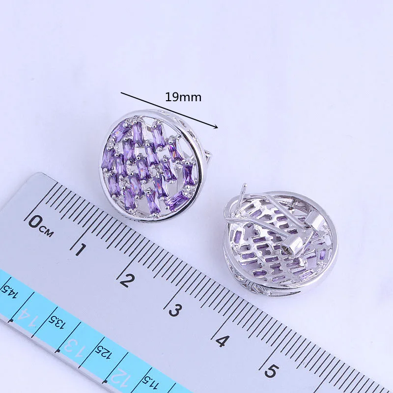 Круглые серьги-клипсы серебряного цвета с изысканными фотоэлементами модные