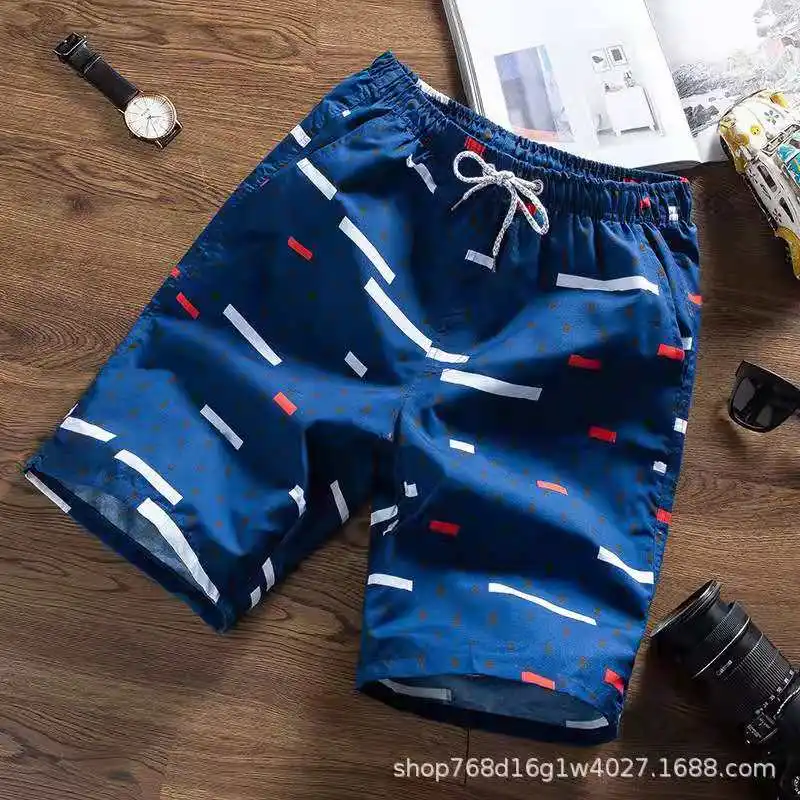 

Wholesale beach pants men's summer trend printing five-point shorts fashion Korean youth seaside vacation quick-drying pants tid