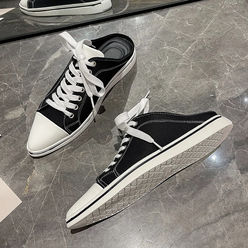 

2021 spring and autumn new design solid color ladies canvas shoes pointed toe flat shoes lace up sneakers