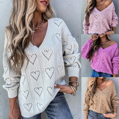 

Women's autumn and winter new sexy solid color V-neck heart shaped hollow loose knitted temperament sweater
