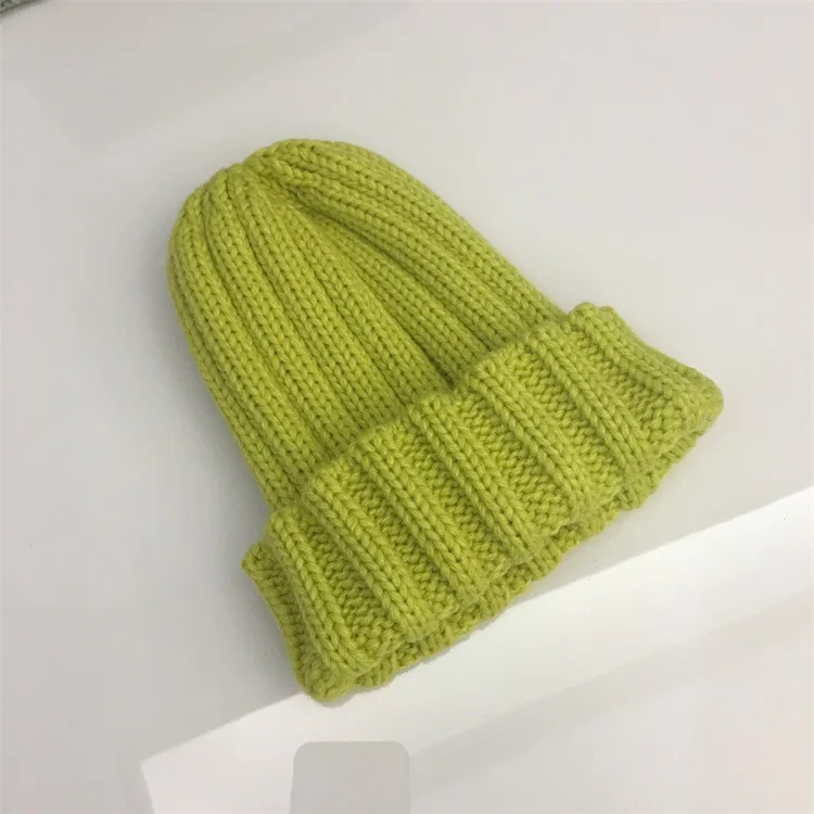 

Korean Female Autumn and Winter Solid Color Joker Knitted Curled Wool Hat Japanese Candy-colored Turtleneck Hat Couple Hat Tide