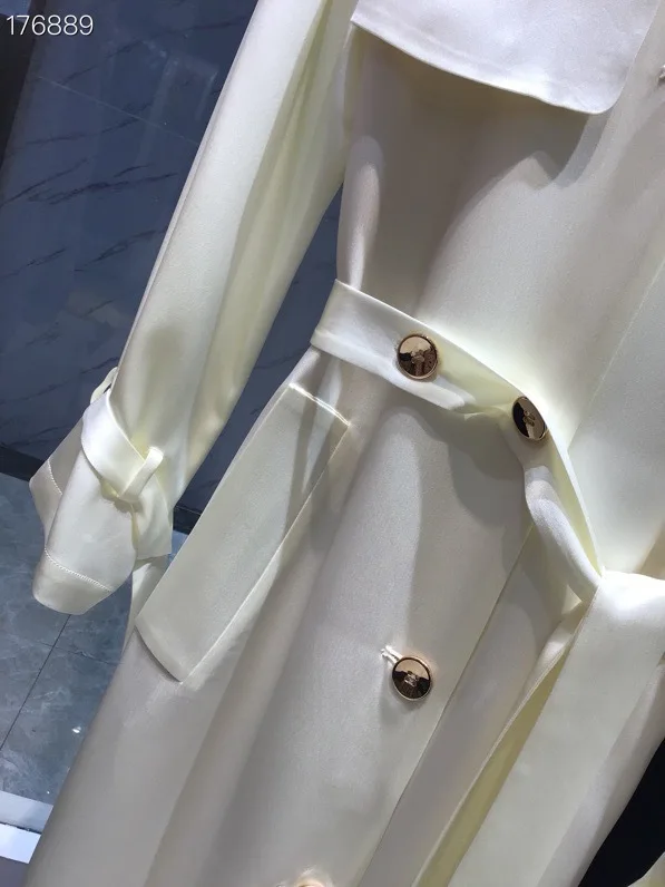 

2021 spring and summer new belt temperament commuting medium long pure color temperament leisure Korean windbreaker