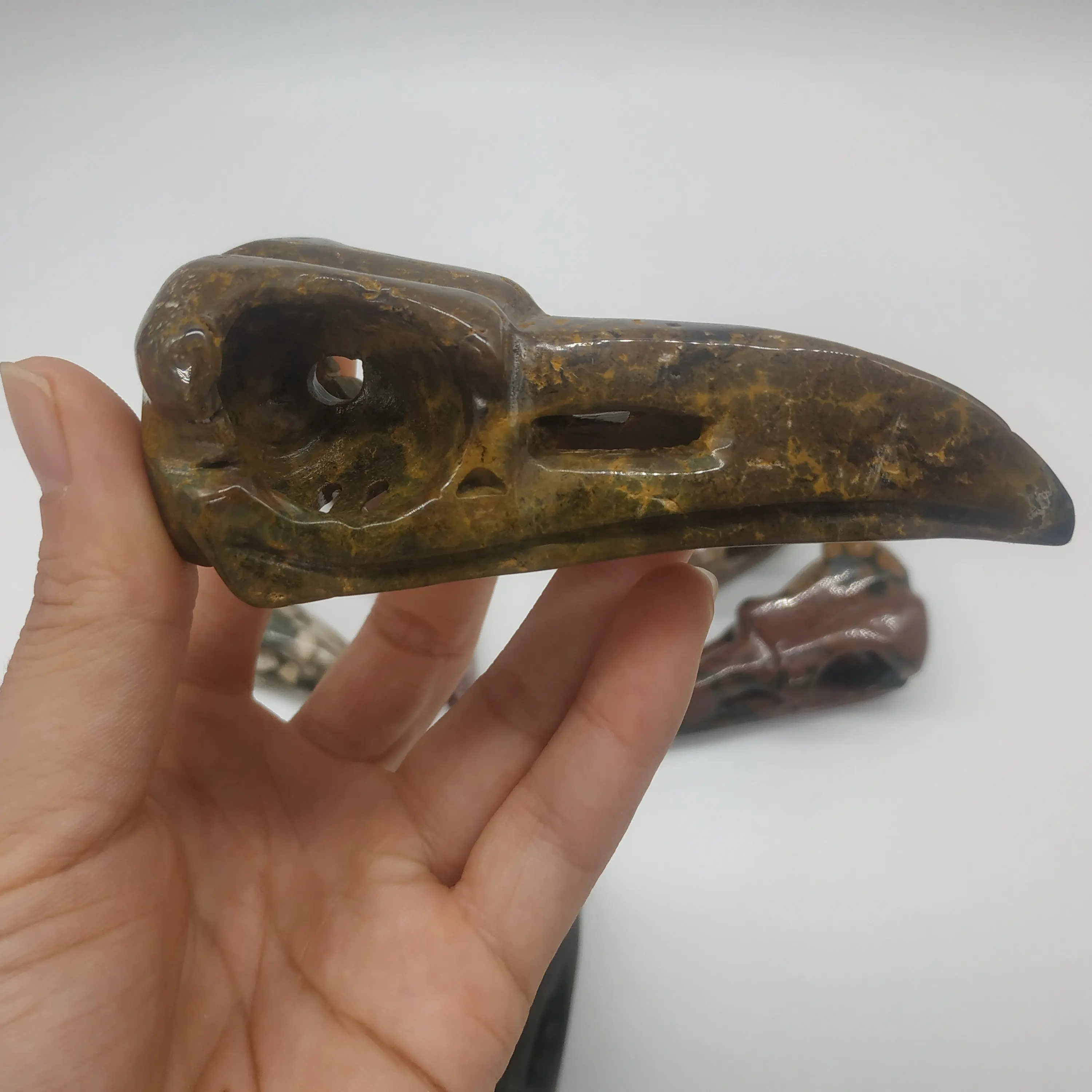 

Natural Quartz Crystal Bird skull Ocean Jasper Quartz Crystal Carved Crow Bird Skull Gifts