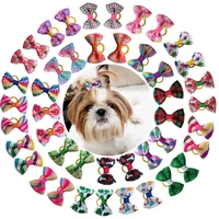 20 pieceslot pet dog hair bows with rubber bands handmade puppy cat headwear grooming loverly bowknot dogs accessories