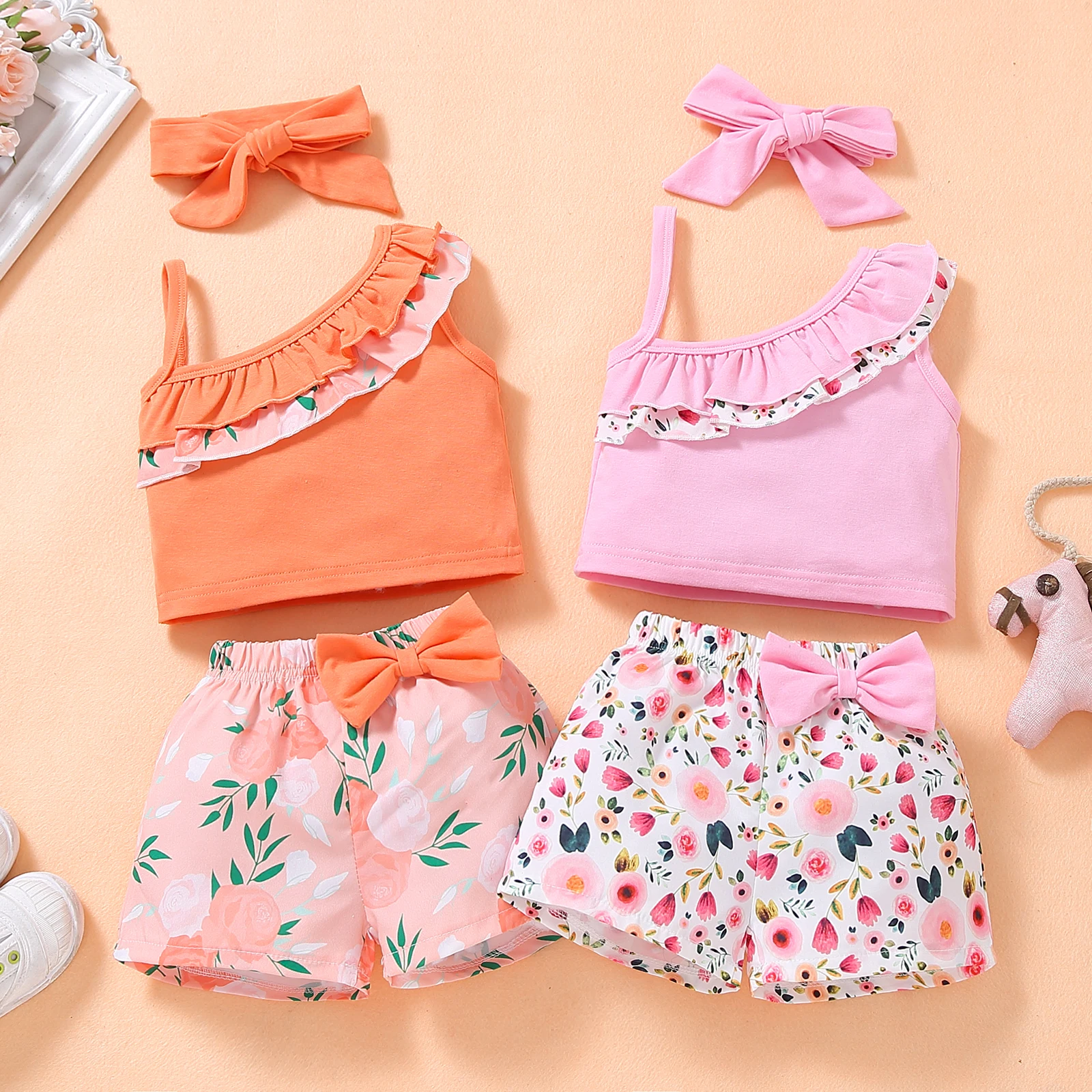 

Fashion Baby Girl’s Summer Three Piece Set Ruffles Suspender Tops and Flower Bow Short Pants with Headband 1-4T