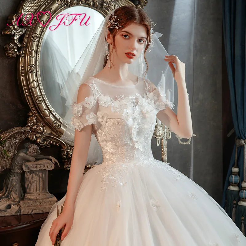 

AXJFU princess little flower white lace bride wedding dress vintage o neck short sleeve bride illusion white wedding dress
