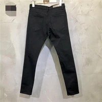 mens casual pants jeans ripped pants spring and autumn new dark fashion trend knife cut slim stretch pencil pants