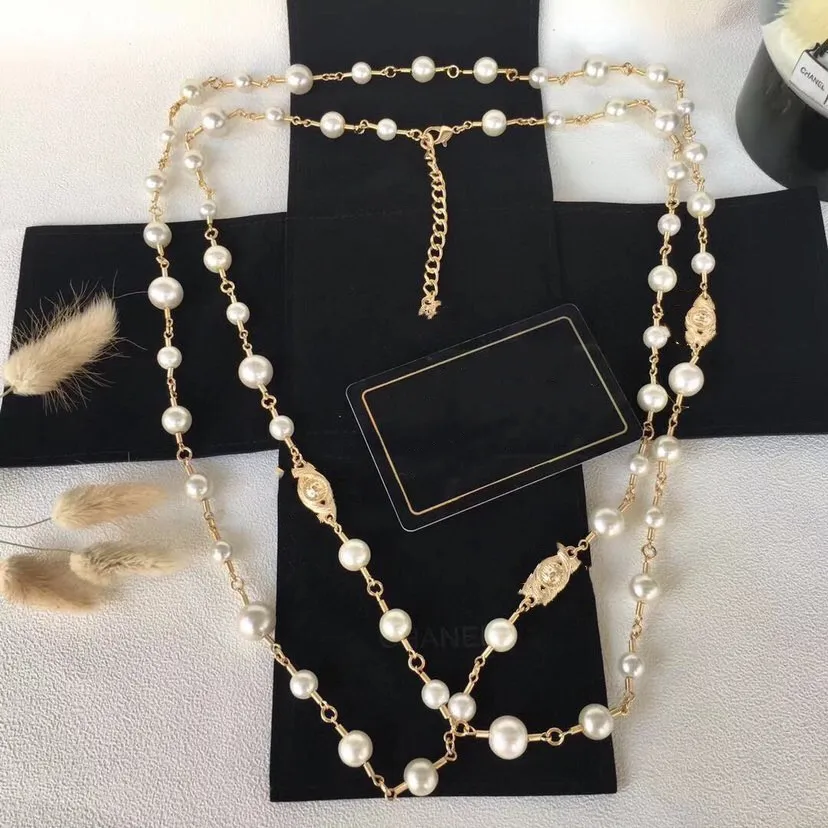 

Женская цепочка на свитер, длинное жемчужное золотое ожерелье и двойные буквы, серебряное ожерелье, горячая Распродажа для зимнего пальто, ...