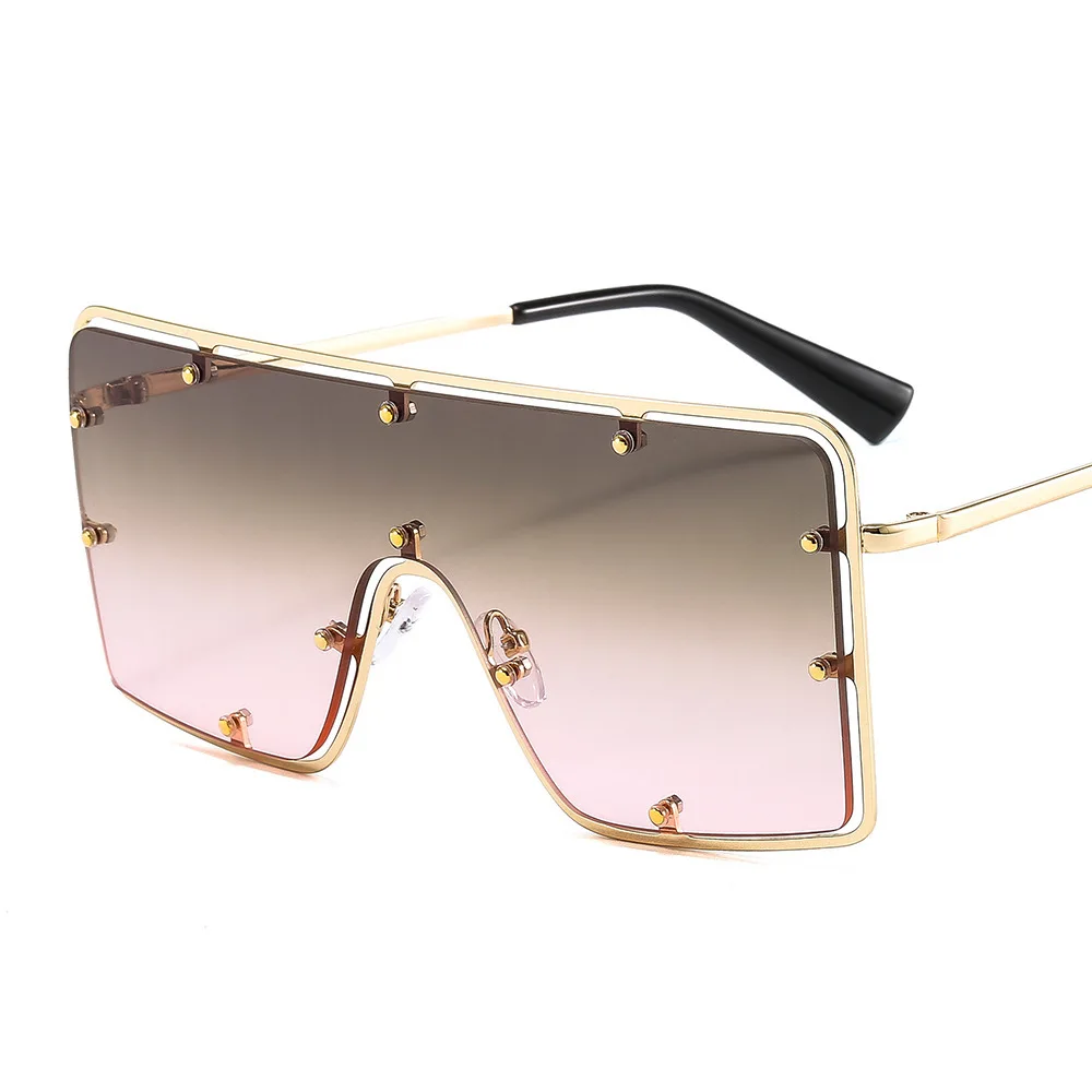 

Free shipping Metal frame rivet trend personality Sunglasses men and women with INS fashion UV400 Sunglasses