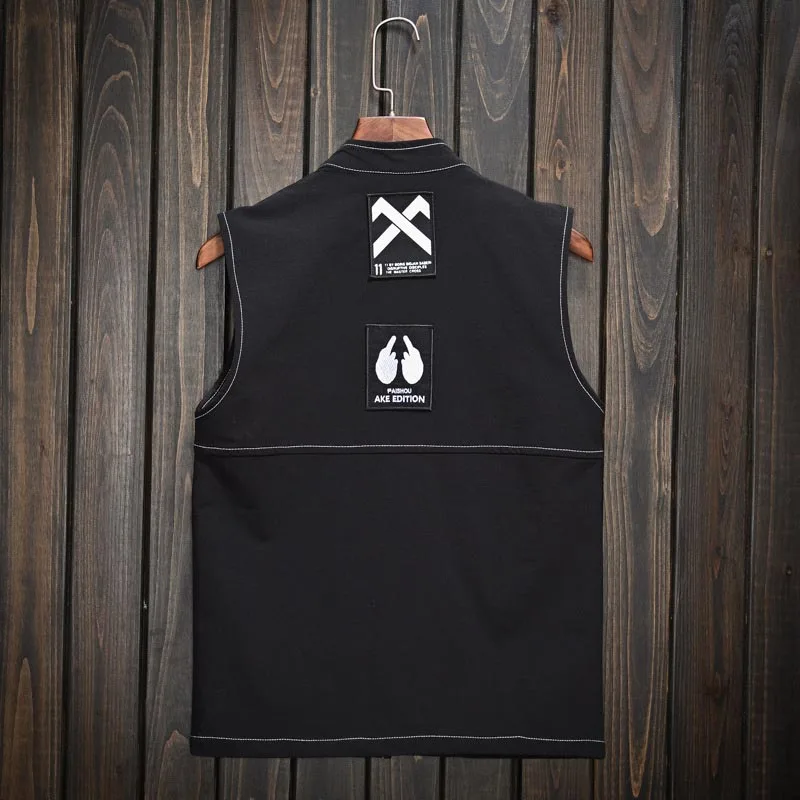 

Mcikkny Men Fasion Casual Vest Multi Pockets Classic Waistcoats For Male Size M-5XL Black Color