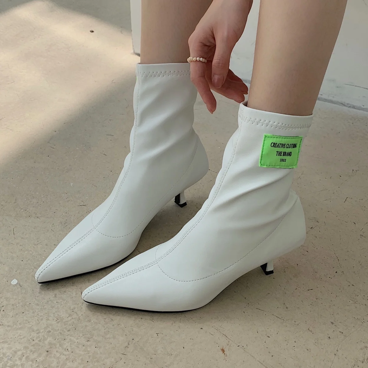 

2021 sexy fall/winter stretch stovepipe pointed cat with letter cloth logo high-heeled short boots