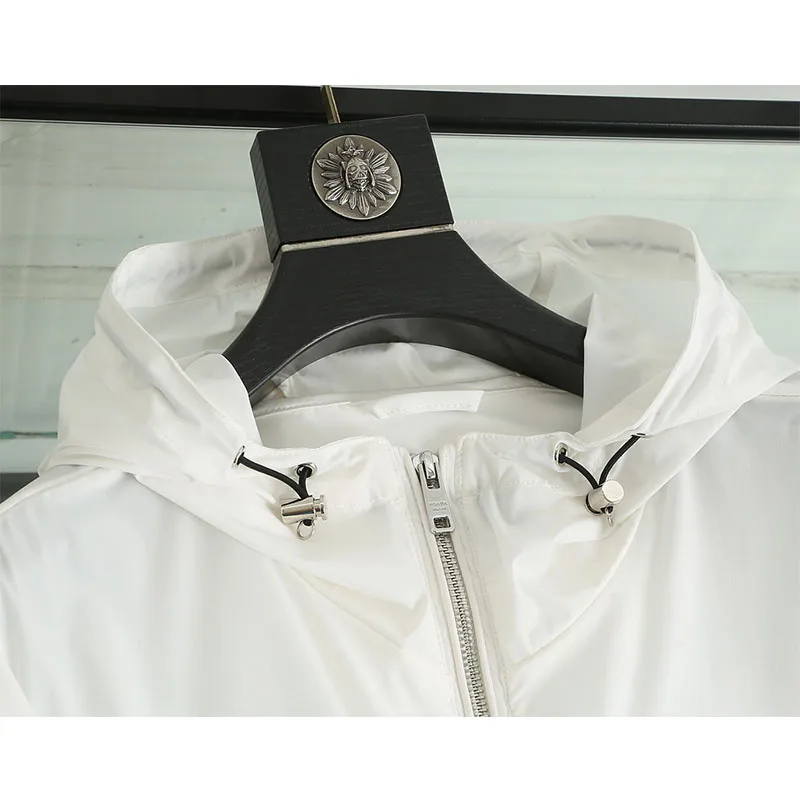 

Men And Women With The Same Spring And Summer New Windbreaker Hooded Long-sleeved Fashion Casual Thin Coat Skin is the clothes