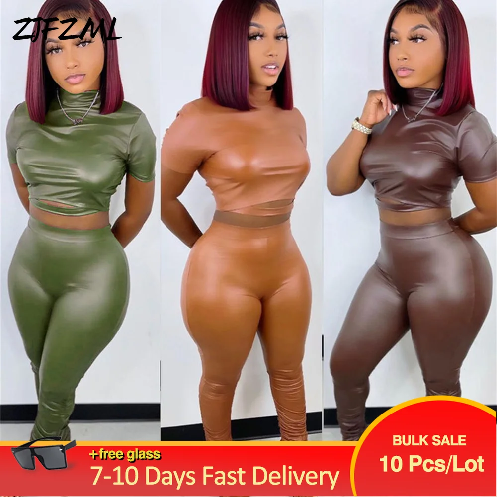 

Wholesale Bulk Items Lots Hipster Women's Tracksuit Faux Pu Leather High Necked Short Sleeve Hollow Tops+split Hem Ruched Pants