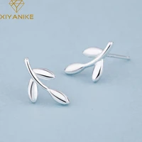 xiyanike silver color prevent allergy leaves stud earrings for women small trendy ear hoops handmade wedding jewelry