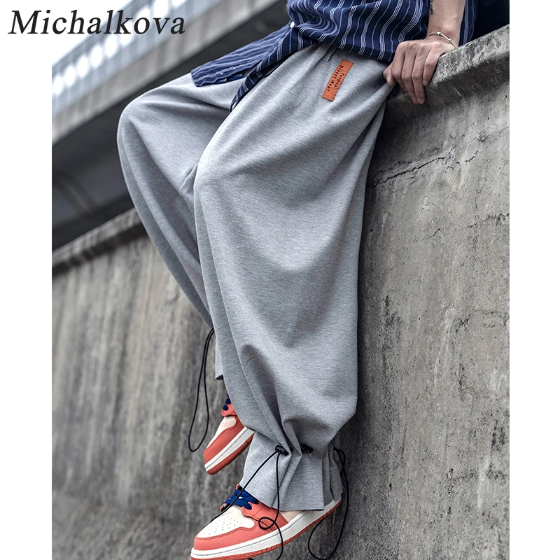 Брюки мужские оверсайз на шнуровке Харадзюку тёмные брюки султанки с эластичным