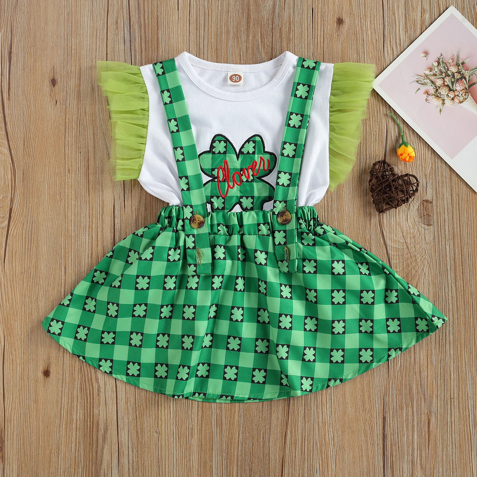 

OPPERIAYA Baby Girls Casual Suit Round Neck Short Mesh Sleeve Falbala Elastic T-shirts Four Leaf Clover Print Suspender Skirts