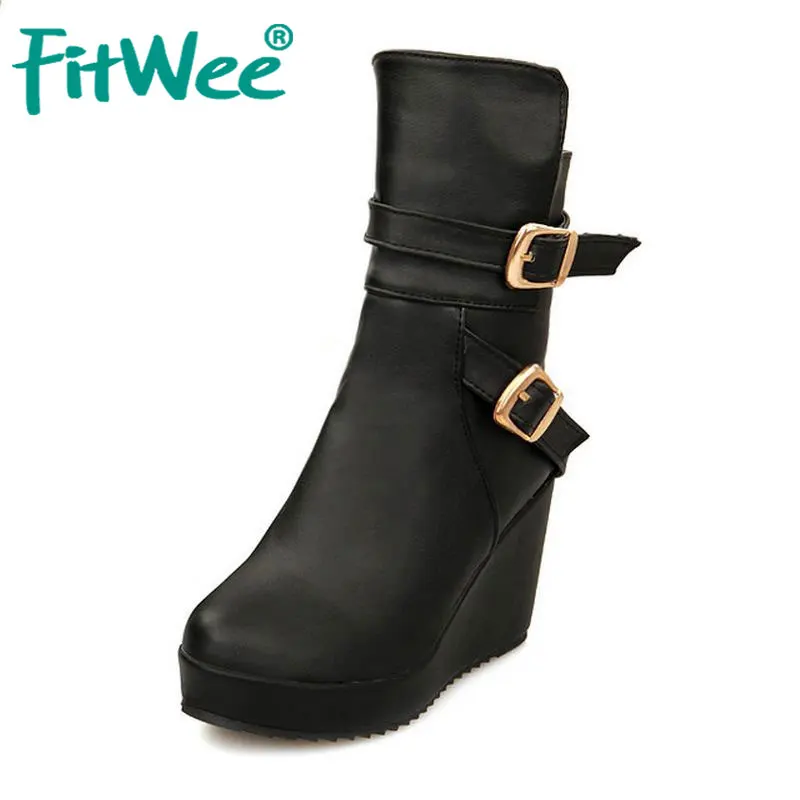 Женские ботинки на высокой танкетке с подъемом подошвы и скрытым высоким