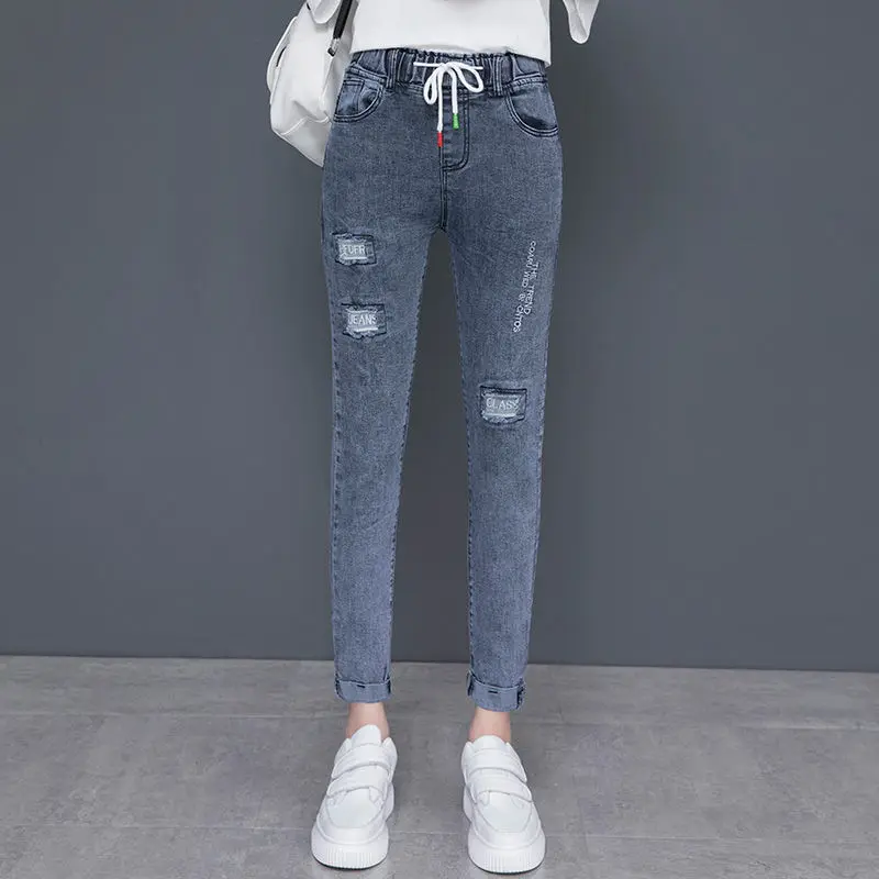 

Elastic high waisted jeans women spring and autumn loose Korean quarter pants women's father radish pants Harem Pants